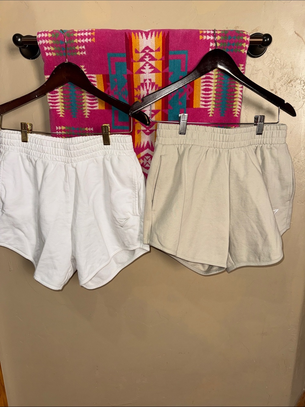 New-Lot of two pair-GYMSHARK SHORTS-women’s medium. White & tan
